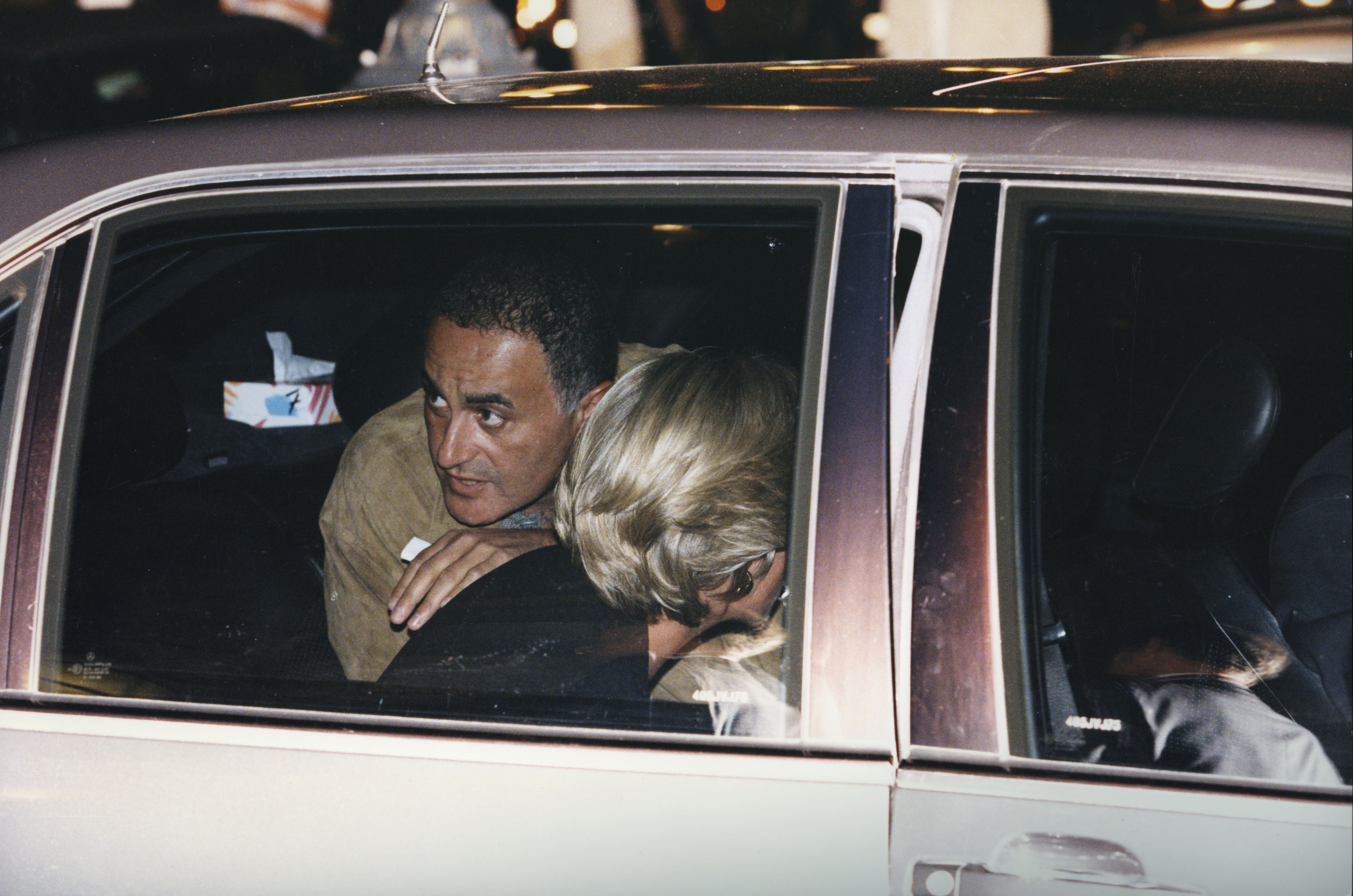 Princess Diana and Dodi Fayed in the back of a car