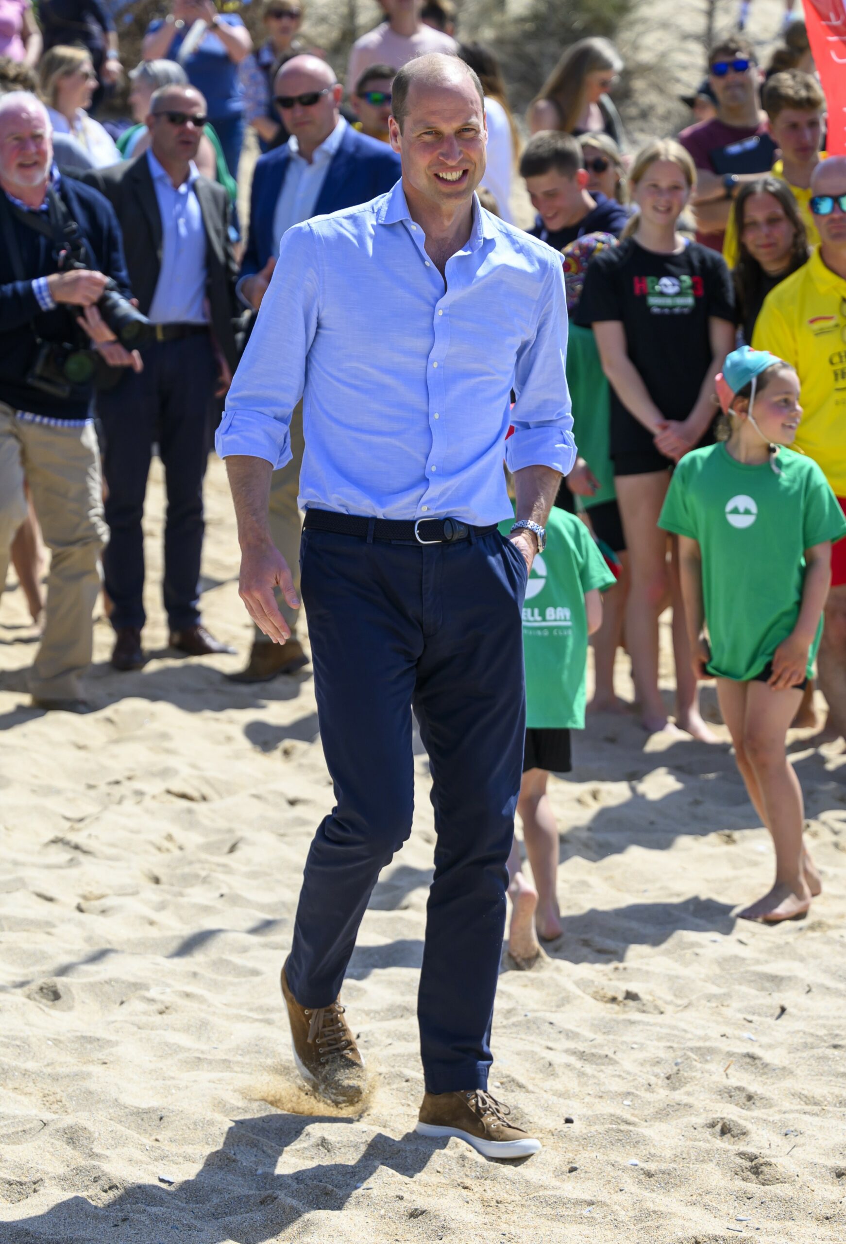 Prince William smiling in a light blue suit