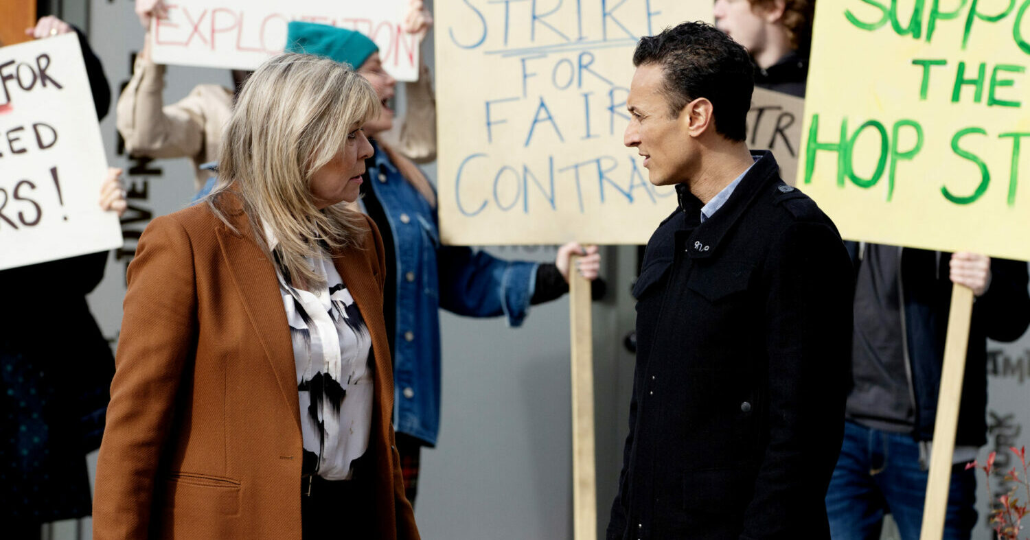 Emmerdale KIm and Jai in front of picket line. Kim angry.